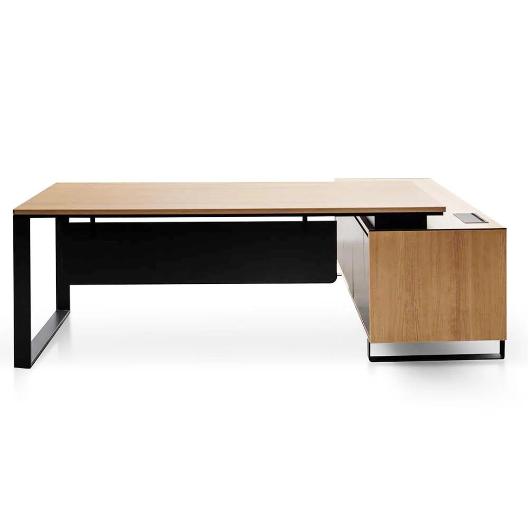 Janel Managers Table with built-in power port, black steel loop legs, and side cabinet storage.