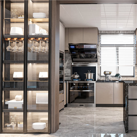 Modern marble finish kitchen with black countertops, gold pendant lights, and integrated appliances for luxury Pakistani homes