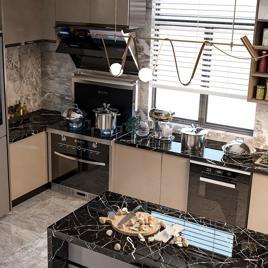 Modern marble finish kitchen with black countertops, gold pendant lights, and integrated appliances for luxury Pakistani homes