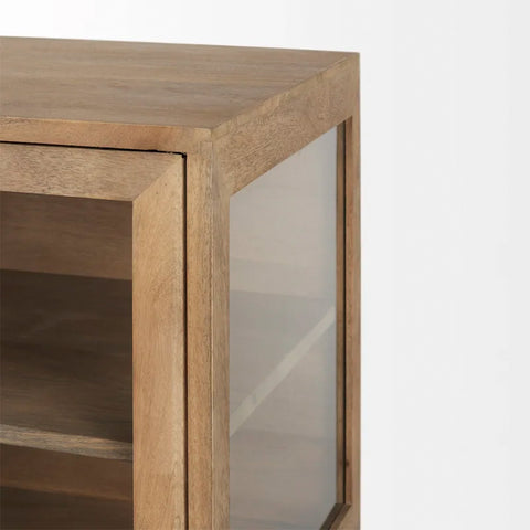 Warner Chisel Console with glass-paneled doors, solid yellow pine wood frame, and matching centre table in a modern living room setup.